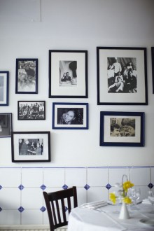 Family pictures adorn the walls inside La Famiglia